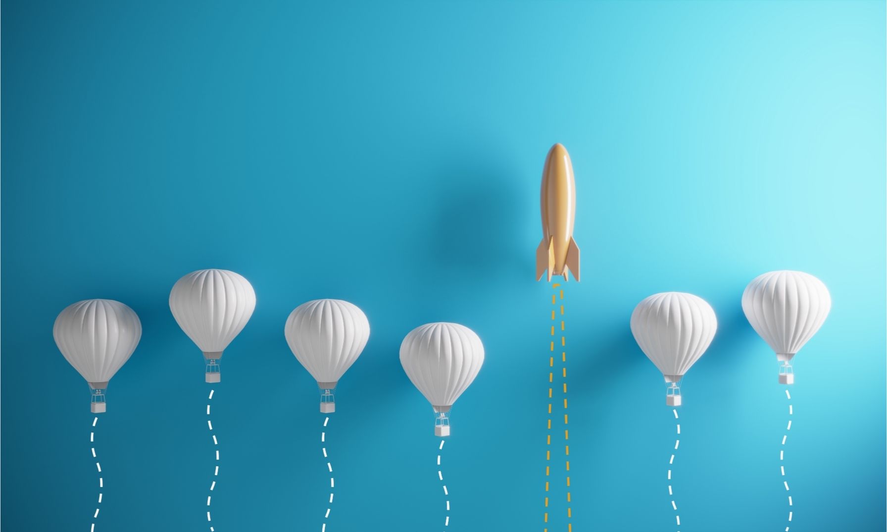 a yellow rocket flying out of six white balloons with blue wall backdrop