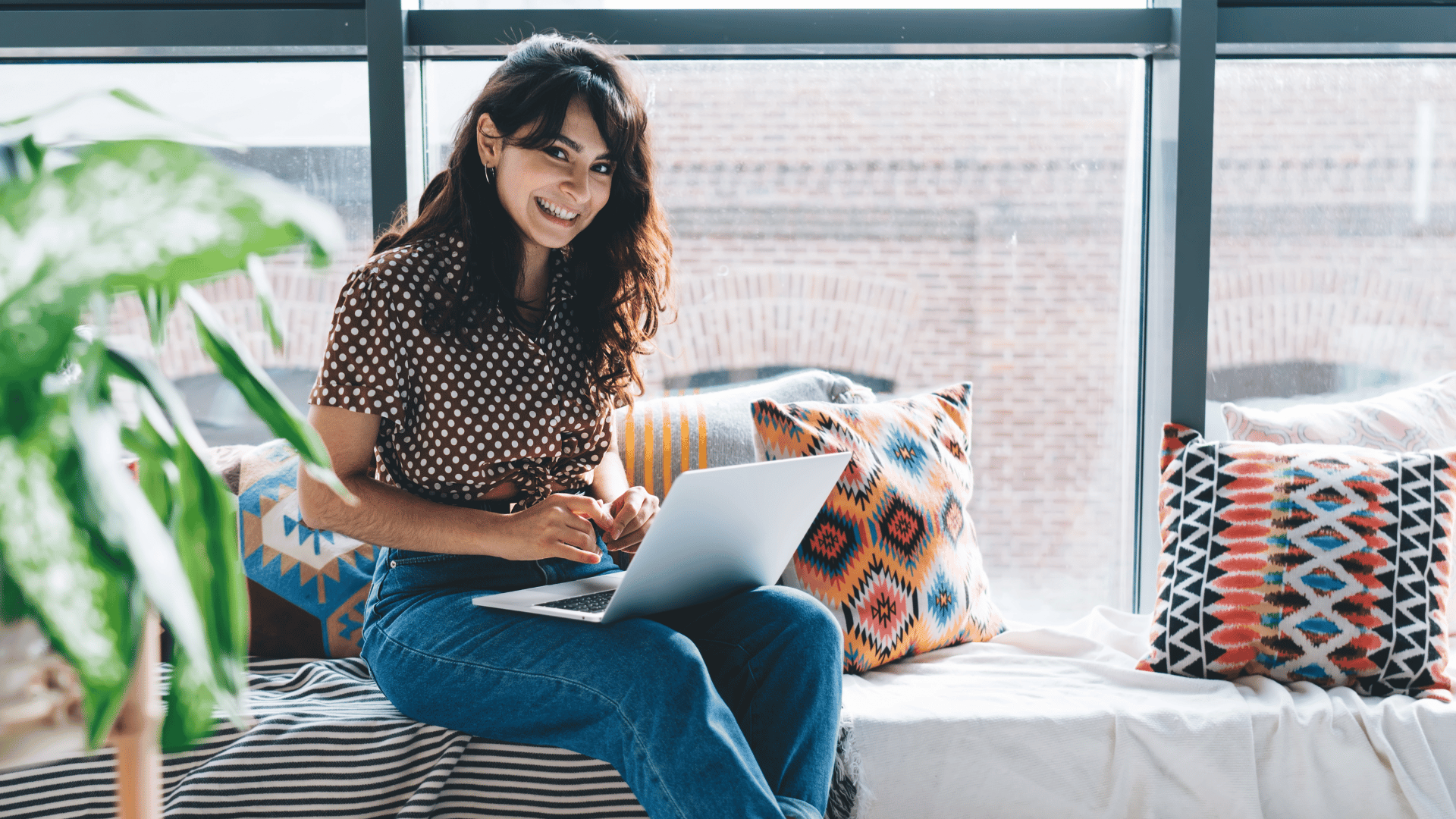 a business woman looking at her laptop